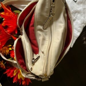 Shoulder Strap  Max: 24"
Height: 9.5"
Width: 12"
Depth: 2.5"